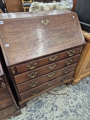 Lot 954 - A late Georgian mahogany bureau with fitted...