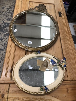Lot 955 - Two oval wall mirrors Prov. Consigned from...
