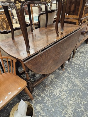 Lot 961 - A Georgian oak gateleg dining table.  Height...