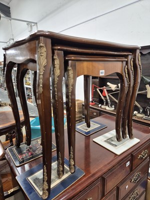 Lot 965 - A mahogany and brass mounted nest of tables.