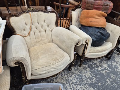 Lot 977 - A pair of french style show frame armchairs.