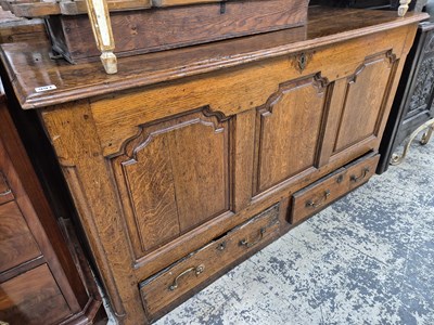 Lot 991 - An 18th-century oak panel front mule...