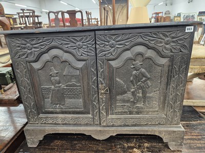 Lot 993 - A 19th-century carved oak small side cabinet....