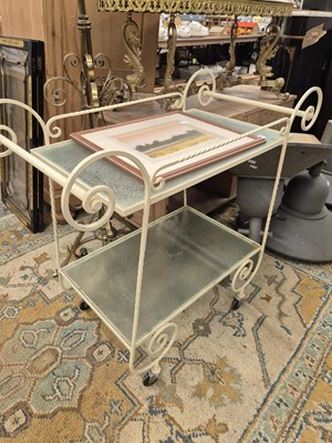 Lot 997 - A wrought iron tea trolly.