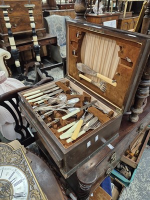 Lot 1010 - A cased part set of cutlery.