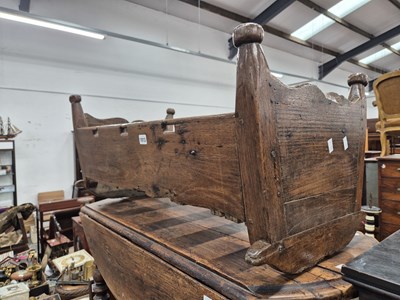 Lot 1013 - A Georgian oak rocking cradle.