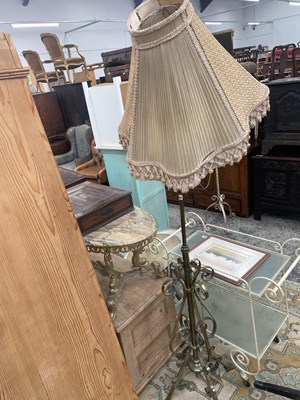 Lot 1025 - A brass standard lamp.
