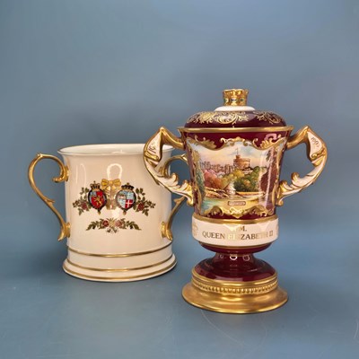 Lot 380 - A limited edition Aynsley claret ground two...