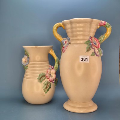 Lot 381 - Two Clarice Cliff grey ground vases moulded...