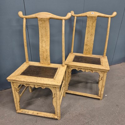 Lot 383 - A pair of Chinese cream painted chairs, the...