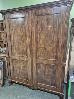 Lot 1027 - A Large mahogany wardrobe. H 214 W 167 D 66cms
