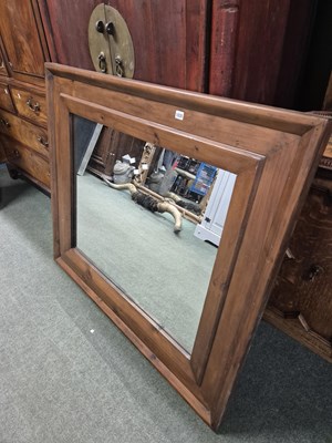 Lot 1035 - A large pine framed mirror.