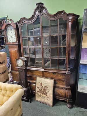 Lot 1038 - A 19th century Dutch display cabinet on a...