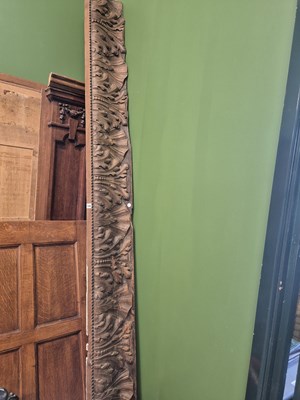 Lot 1045 - A large 19th century carved oak cresting rail....