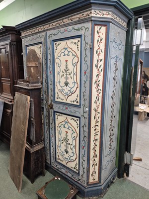Lot 1054 - A large continental painted pine two door hall...