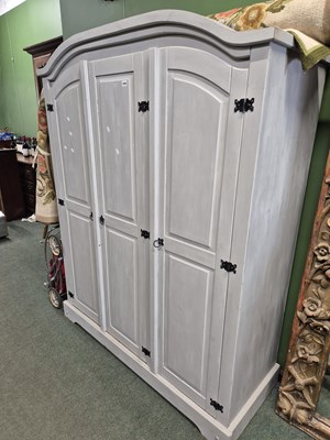 Lot 1059 - A modern painted pine wardrobe.