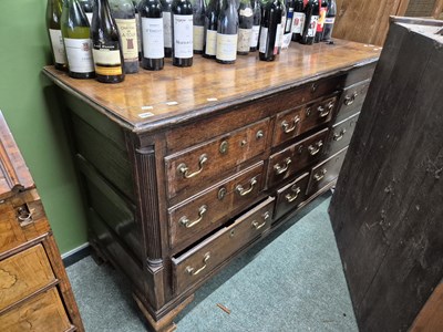 Lot 1060 - A large Georgian oak mule chest with faux...
