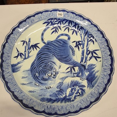 Lot 392 - A Japanese Arita blue and white dish painted...