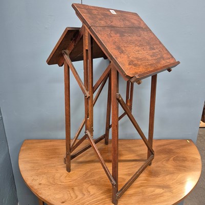 Lot 393 - An oak folding easel/table, the two halves of...