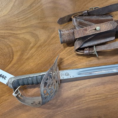 Lot 399 - A Victorian officer's sword in a leather...