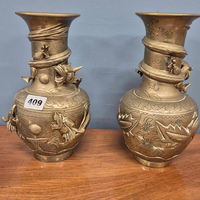 Lot 409 - A pair of early 20th century Chinese bronze...