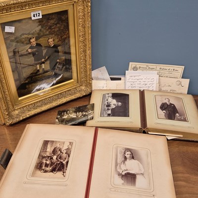 Lot 412 - Two albums of Victorian and later portrait...