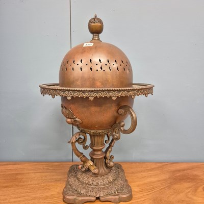 Lot 420 - A copper brazier and domed cover, the cup...