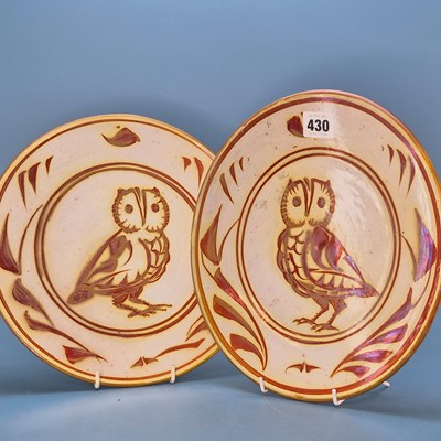 Lot 430 - A pair of Alan Caiger Smith orange lustre...