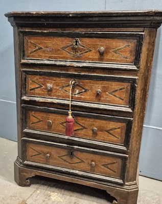 Lot 439 - An early 19th century ebonised walnut chest,...