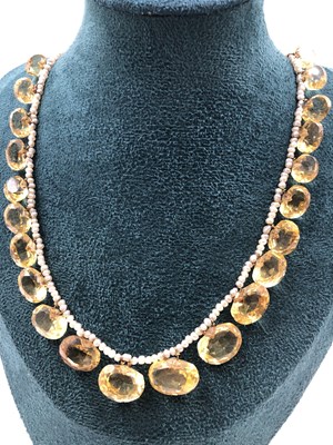 Lot 7 - An antique lemon gem-set and pearl graduated...