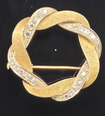 Lot 9 - An antique diamond set wreath brooch complete...