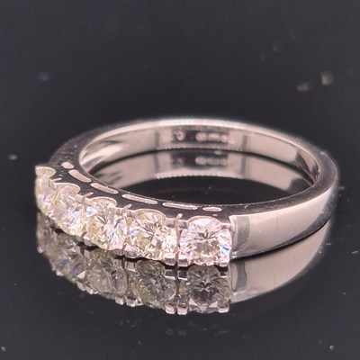 Lot 11 - An 18ct hallmarked white gold five-stone...