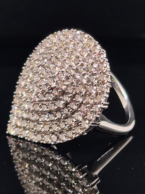 Lot 12 - A 9ct hallmarked white gold pear-shaped...