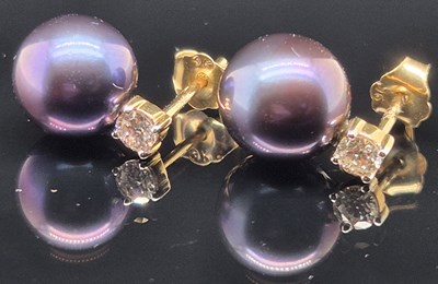 Lot 21 - A pair of 9ct hallmarked gold blue/purple...