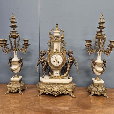 Lot 454 - An ormolu, bronze and white marble clock...