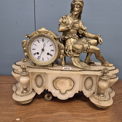 Lot 455 - An alabaster and gilt spelter mantel clock...