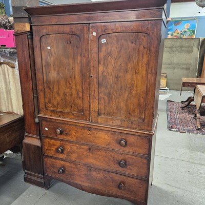 Lot 460 - A 19th-century mahogany linen press, the top...