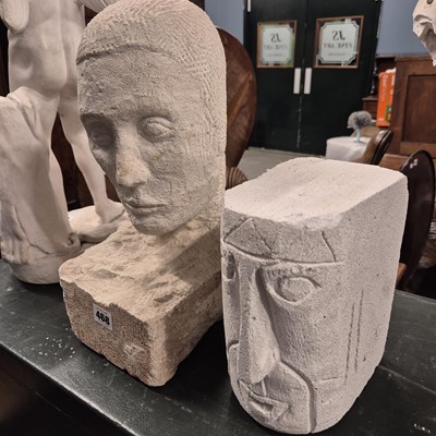 Lot 468 - A carved limestone human head.   H 38cms....