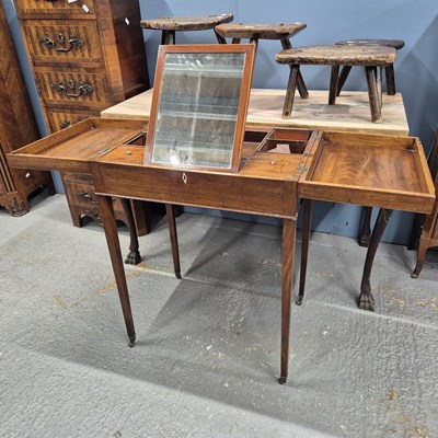 Lot 474 - A 19th century French mahogany poudreuse, the...