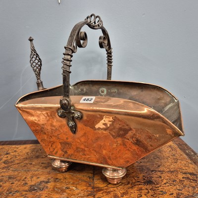 Lot 482 - An Arts and Crafts copper coal bucket and...
