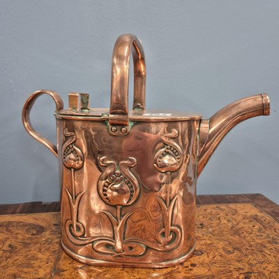 Lot 483 - An Art Nouveau copper hot water can by J...