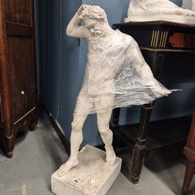 Lot 485 - A plaster figureof a naked bearded man,...