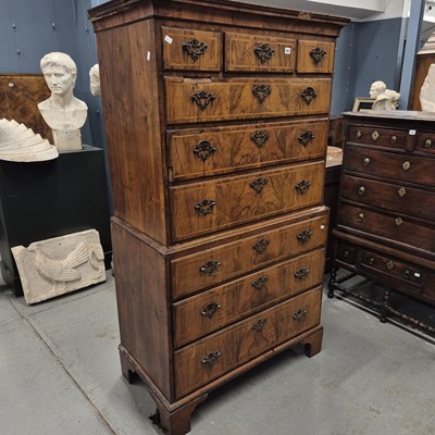 Lot 491 - A George III line inlaid walnut chest on chest,...