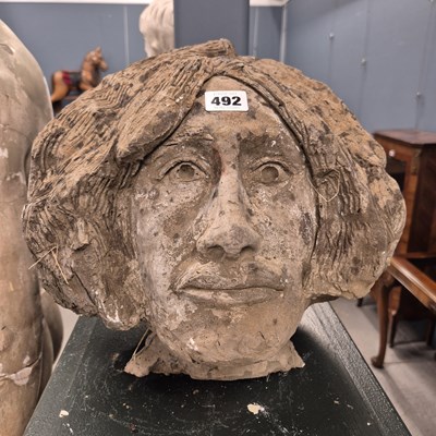 Lot 492 - A composition head of lady.   H 32cms.