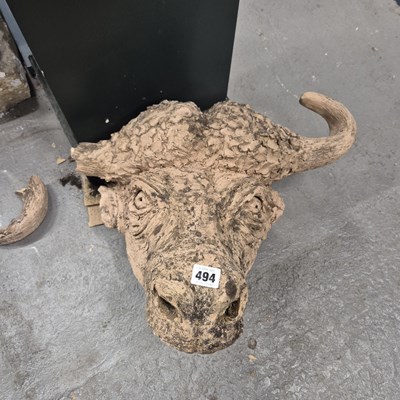 Lot 494 - A  sculpted terracotta head of a bull.   W 58cms.