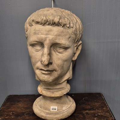 Lot 498 - A plaster bust of Augustus Caeser on a socle...