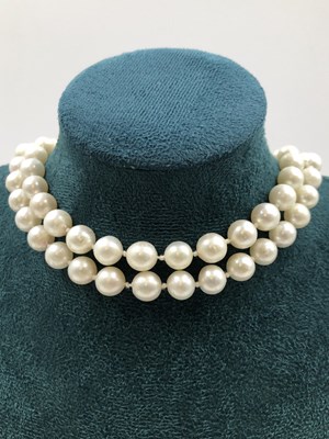 Lot 32 - A double-row pearl necklace. The shortest...