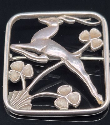 Lot 51 - A vintage hallmarked silver deer and clover...