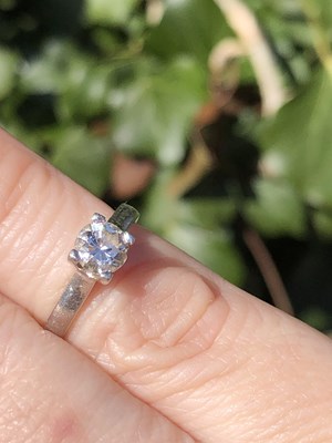 Lot 65 - A diamond and platinum hallmarked solitaire...