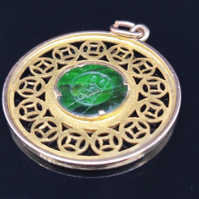 Lot 66 - A vintage eastern character pendant the...